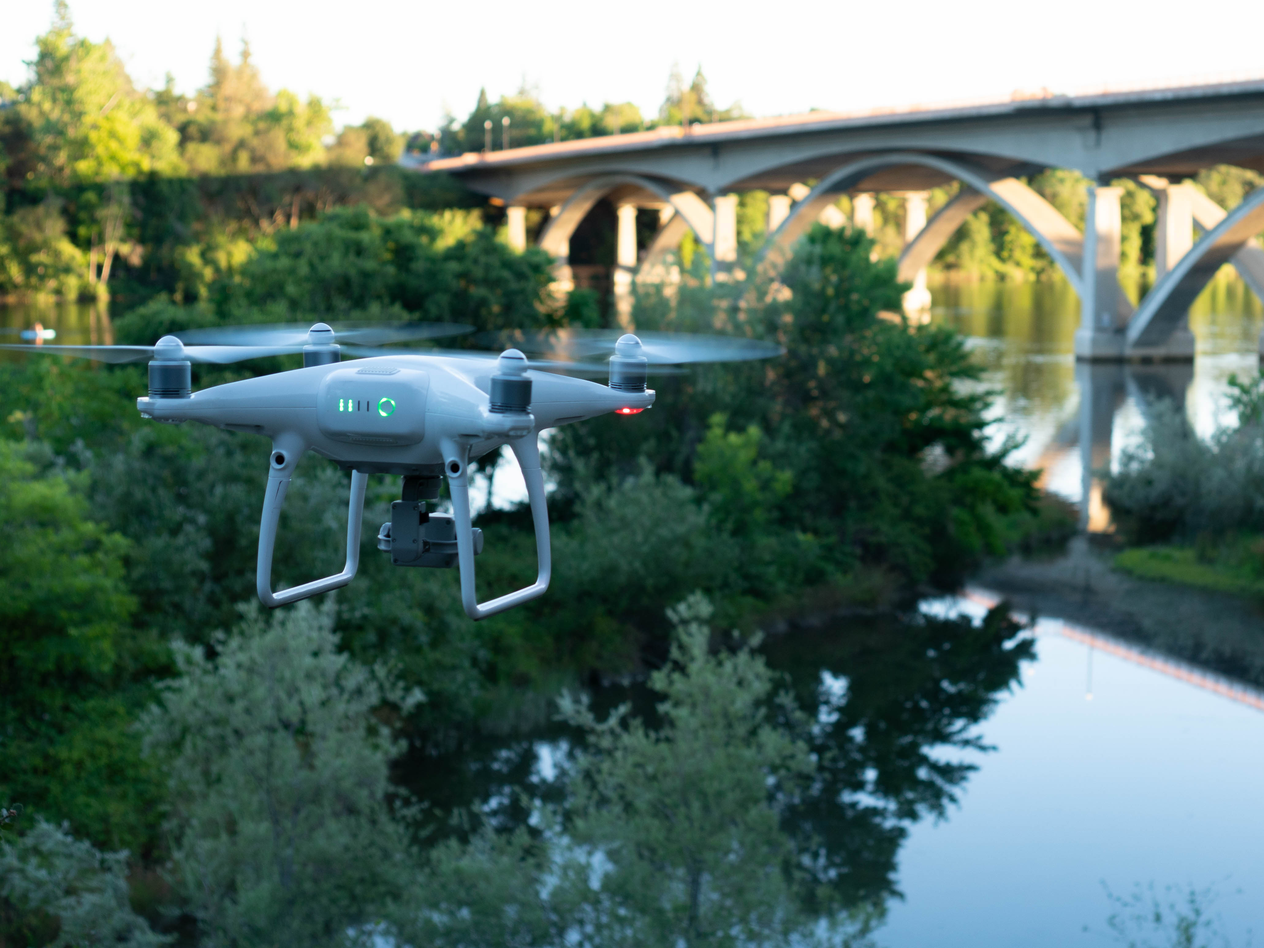 Drone in foreground, bridge in the background